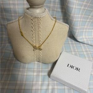 Dior delicate bow necklace.